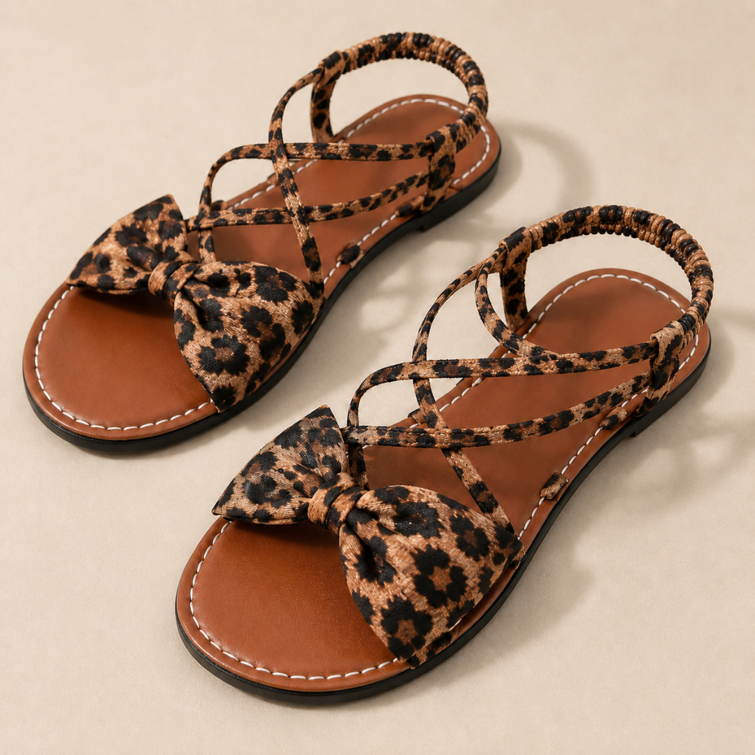 Sandálias rasas com laço e tiras elásticas